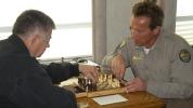 Arnold-Schwarzenegger-plays-chess-during-the-break-of-filming-Last-Stand-2011.jpg